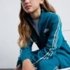 Nike Sportswear Tracksuit Taped UnisexGiacca SportivaGeode Teal/White Bambini Abbigliamento Outwear NI126D0BM-P11 -DeFacto Italia 2025 78ccc593989e418aaab00be9c145b289