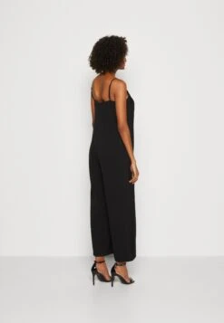 Marc O'Polo Overall Slip Style Cropped V-Neck Spaghetti StrapsTuta JumpsuitBlack Donna Tute Jumpsuit MA321T017-Q11 -DeFacto Italia 2025 8d536c28ed194b4f813881cd6a2ad1a9