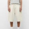 PULL & BEAR Baggy Fit Wide-Leg-Bermuda Shorts Di JeansBeige Uomo Jeans PUC22F0DH-B11 2 PULL & BEAR Baggy Fit Wide-Leg-Bermuda Shorts Di JeansBeige Uomo Jeans PUC22F0DH-B11 -DeFacto Italia 2025 9aa6b2f44bf34efe8d1251ae40fbde85