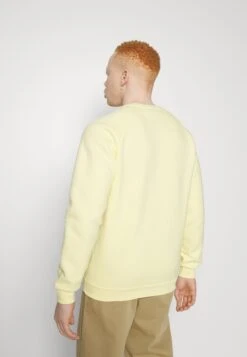 Adidas Originals Essential CrewFelpaAlmost Yellow Uomo Maglieria E Felpe AD122S0OQ-E11 -DeFacto Italia 2025 baa3826dfd2147fb83c41f34d9d7d67a