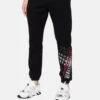 John Richmond Pantaloni SportiviNero Uomo Pantaloni Sportivi E Joggers JOJ22E00O-Q11
