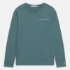 Calvin Klein Jeans Chest UnisexMaglietta A Manica LungaArctic Bambini T-shirt & Top C1826G01K-K11 -DeFacto Italia 2025 bdd0bb1b1fa5406e9bf0190854306f27