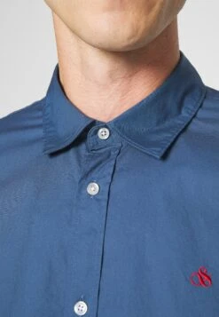 Scotch & Soda Essential SolidCamiciaStorm Blue Uomo Camicie SC322P054-K11 -DeFacto Italia 2025 e376587e97f24fe5abad52bfa937ac99