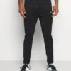 Reebok PantPantaloni SportiviBlack Uomo Pantaloni Sportivi E Joggers RE542K00V-Q11