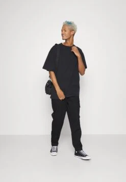 Puma PantsPantaloni CargoBlack Uomo Pantaloni PU122E08B-Q11 -DeFacto Italia 2025 ec41de2357ed4e5984ad235f0725bd69